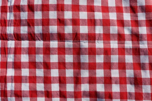 Red Checkered Picnic Tablecloth Background Top View — Stockfoto