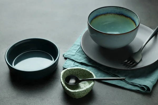 Set Stylish Empty Dishware Cutlery Grey Table — Stok fotoğraf