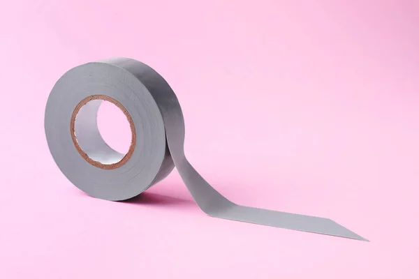 Grey Insulating Tape Pink Background Space Text — стоковое фото