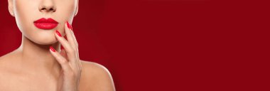 Woman with beautiful lips on red background, closeup view with space for text. Banner design