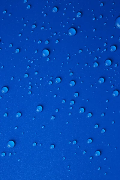 Σταγόνες Νερού Μπλε Φόντο Πάνω Όψη — Φωτογραφία Αρχείου