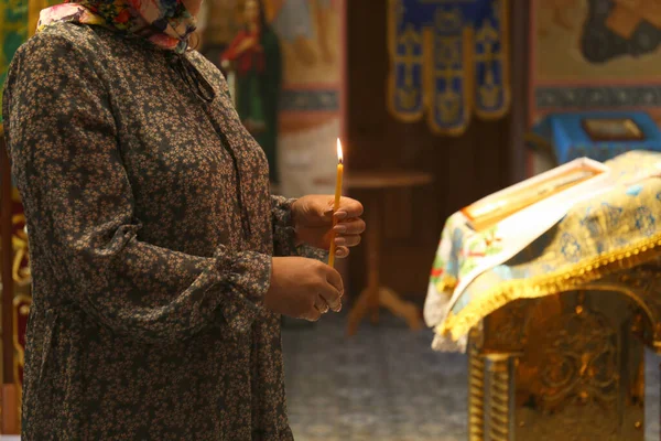 Mature Woman Holding Candle Church Closeup — ストック写真