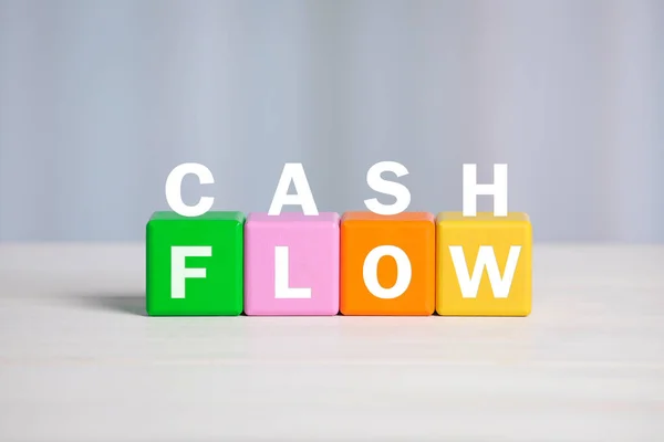 Phrase Cash Flow Made Letters Colorful Cubes Light Background — Stockfoto