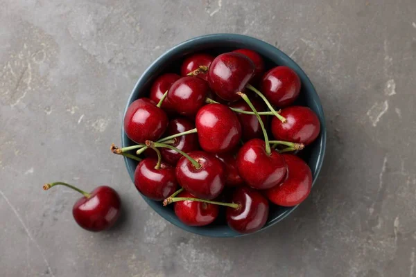 Fresh Ripe Cherries Grey Table Flat Lay — Zdjęcie stockowe