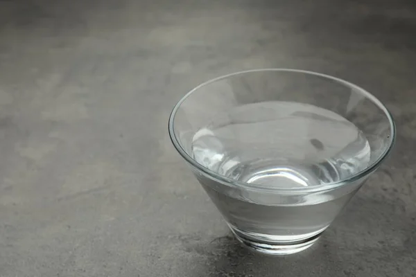 Glass Bowl Water Grey Table Space Text — стоковое фото