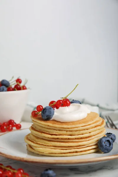 Tasty Pancakes Natural Yogurt Blueberries Red Currants Marble Table — Stockfoto