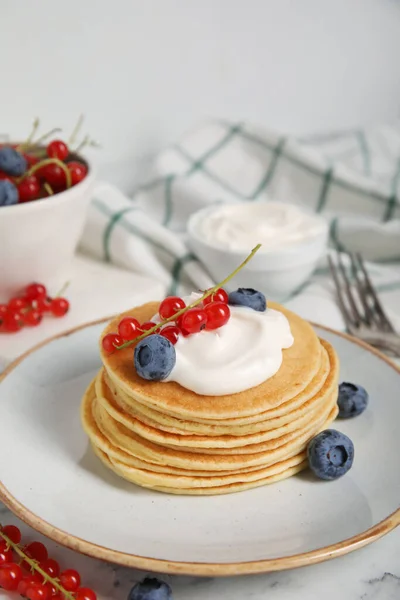 Tasty Pancakes Natural Yogurt Blueberries Red Currants Marble Table — Stockfoto