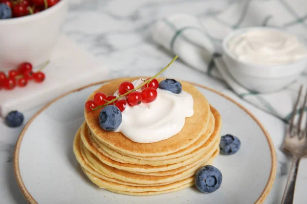 Tasty Pancakes Natural Yogurt Blueberries Red Currants Marble Table — Stockfoto