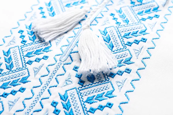 Beautiful Light Blue Ukrainian National Embroidery White Fabric Closeup — Fotografia de Stock