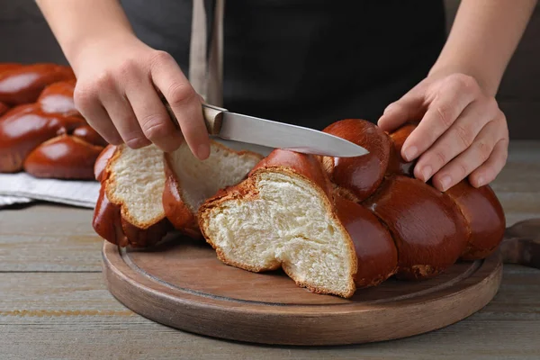 Woman Cutting Homemade Braided Bread Wooden Table Closeup Challah Shabbat —  Fotos de Stock