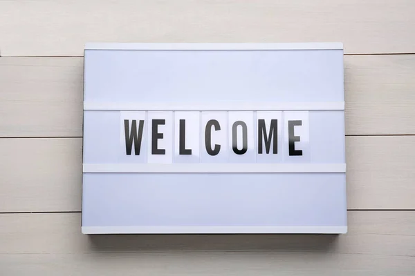 Lightbox Word Welcome White Wooden Background Top View — Foto de Stock