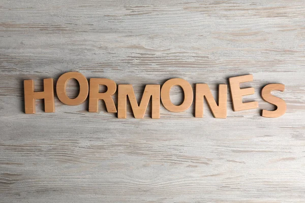 Word Hormones Gemaakt Met Houten Letters Tafel Plat Gelegd — Stockfoto