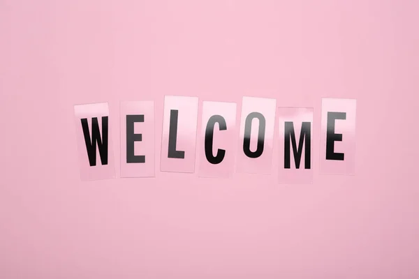 Word Welcome Made Plastic Letters Pink Background Top View — Fotografia de Stock
