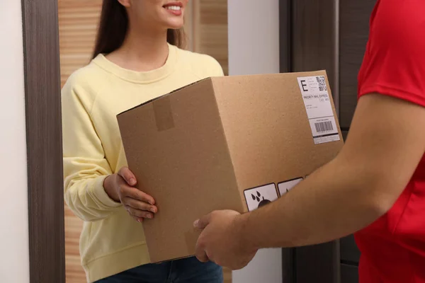 Woman Receiving Parcel Courier Home Closeup — Stockfoto
