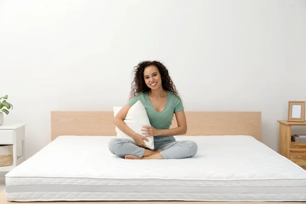 Happy Young African American Woman Holding Pillow Bed Comfortable Mattress — Photo