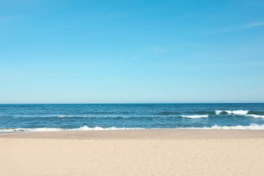Picturesque view of beautiful sea and sandy beach on sunny day