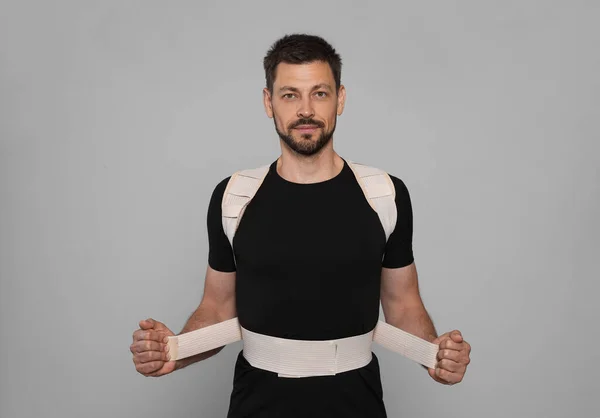 Handsome Man Orthopedic Corset Grey Background — Stock Photo, Image