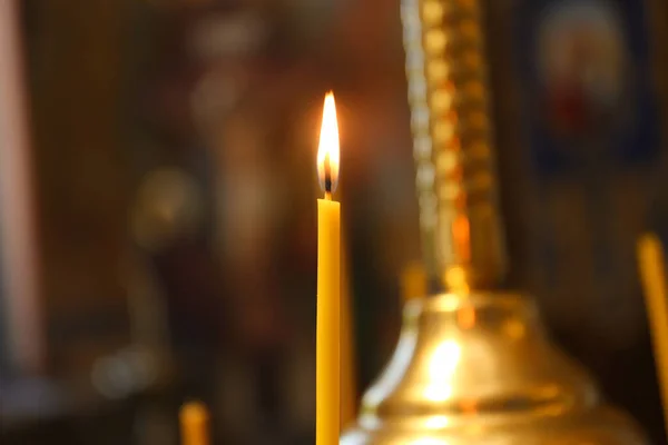 One Burning Candle Church Closeup View — стоковое фото