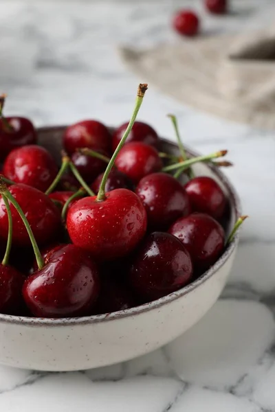 Fresh Ripe Cherries Water Drops Bowl White Marble Table Closeup — стоковое фото