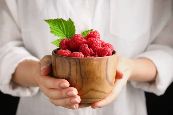 Woman Holding Bowl Ripe Raspberries Closeup — Stockfoto