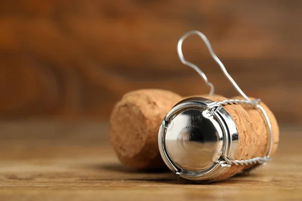 Sparkling Wine Corks Muselet Cap Wooden Table Closeup Space Text — Stockfoto