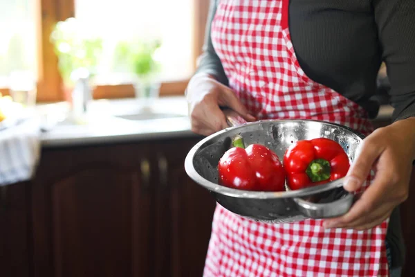 Woman Holding Colander Fresh Bell Peppers Kitchen Closeup Space Text — Fotografia de Stock