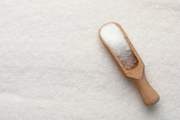 Wooden Scoop Granulated Sugar Top View Space Text — стоковое фото