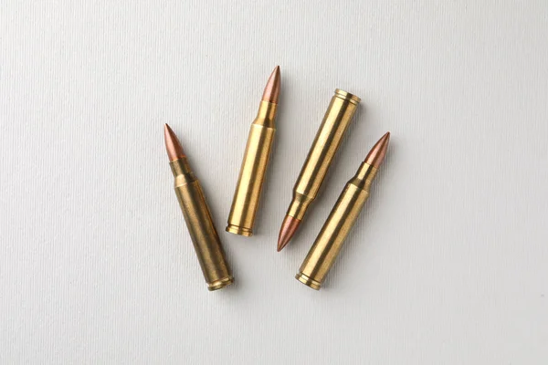 Brass Bullets White Background Flat Lay — Stockfoto