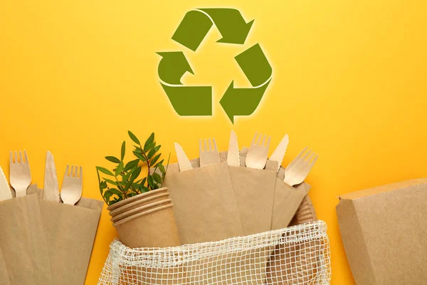 Flat Lay Composition Eco Friendly Tableware Recycling Symbol Yellow Background — Zdjęcie stockowe