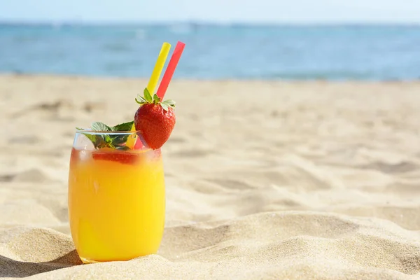 Glass Refreshing Drink Strawberry Sandy Beach Sea Space Text — Stockfoto