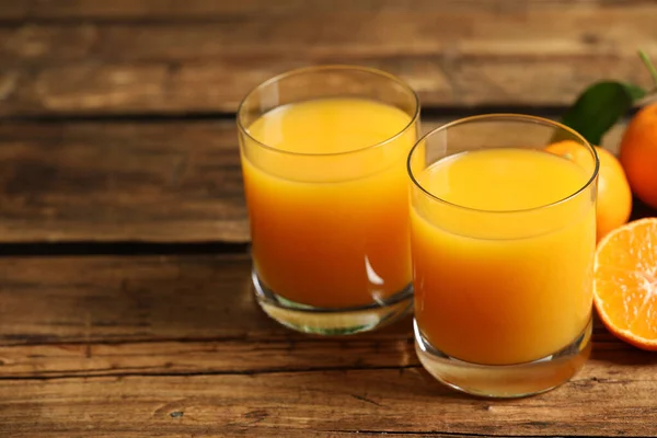 Glasses Fresh Tangerine Juice Fruits Wooden Table — 스톡 사진