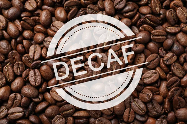 Pile Decaf Coffee Beans Background Top View — Stockfoto