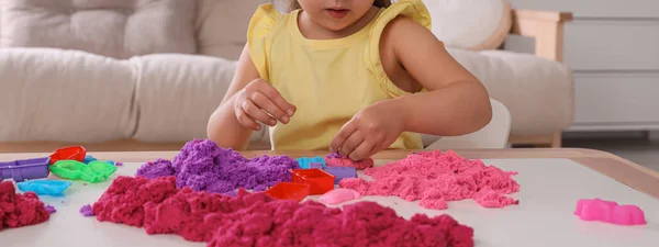 Cute Little Girl Playing Bright Kinetic Sand Table Room Closeup —  Fotos de Stock