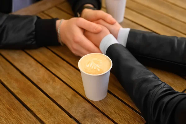 Lovely Couple Coffee Holding Hands Together Wooden Table Closeup Romantic — Foto de Stock