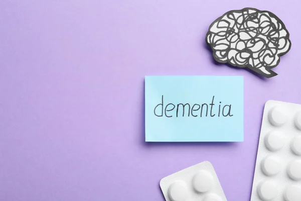Note Word Dementia Brain Cutout Pills Violet Background Flat Lay — Stockfoto