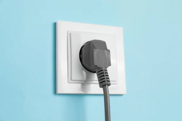 Power Socket Inserted Plug Light Blue Wall Closeup Electrical Supply — Foto de Stock