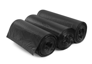 Rolls of different garbage bags on white background. Cleaning supplies