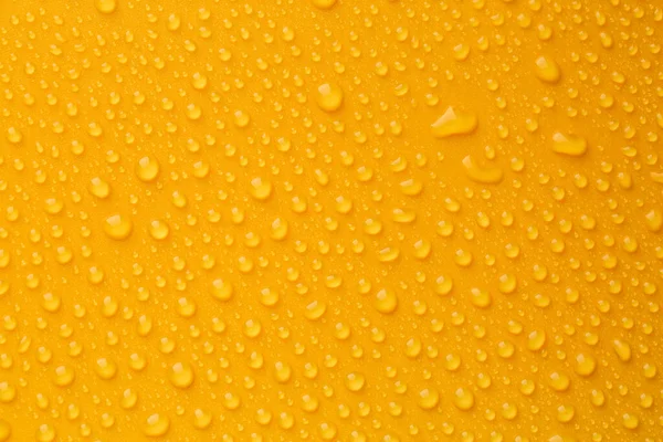 Waterdruppels Oranje Achtergrond Bovenaanzicht — Stockfoto