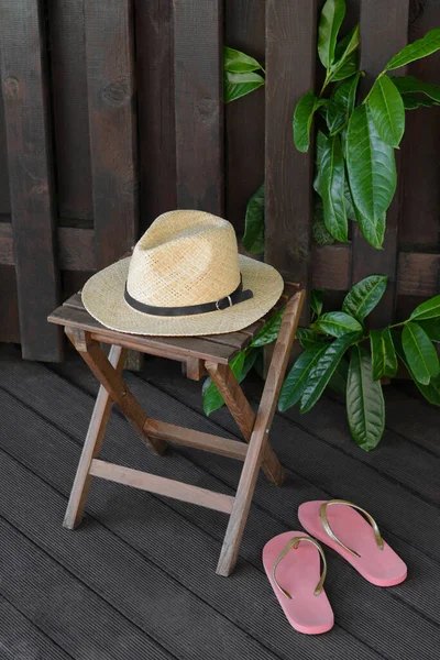 Stylish Hat Flip Flops Wooden Fence Beach Accessories - Stock-foto