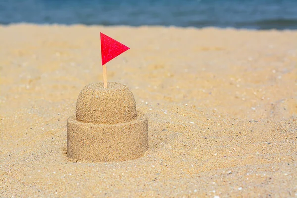 Beautiful Sand Castle Red Flag Beach Space Text — Φωτογραφία Αρχείου