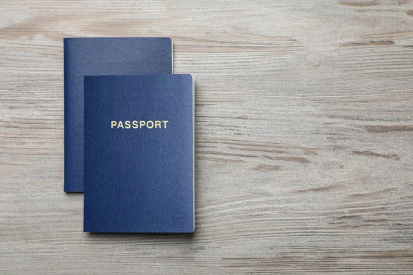 Blank Blue Passports Wooden Table Flat Lay Space Text — Fotografia de Stock