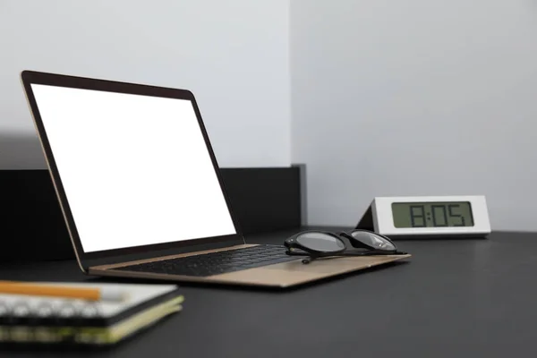 Modern Laptop Blank Screen Black Table Indoors Closeup Mockup Design — Stockfoto