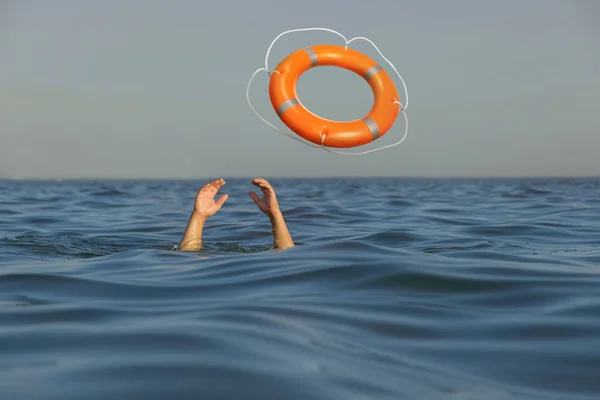 Drowning Man Raised Hands Getting Lifebelt Sea — Stockfoto