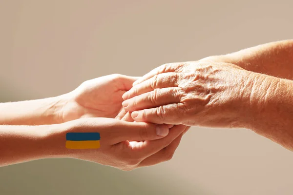 Help Ukraine People Holding Hands Drawing Ukrainian Flag Light Background — стоковое фото