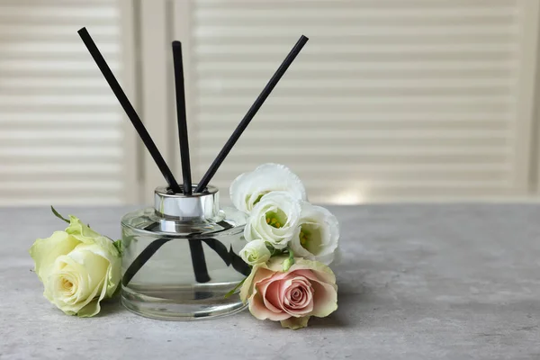 Reed Air Freshener Flowers Grey Table Indoors — Stockfoto