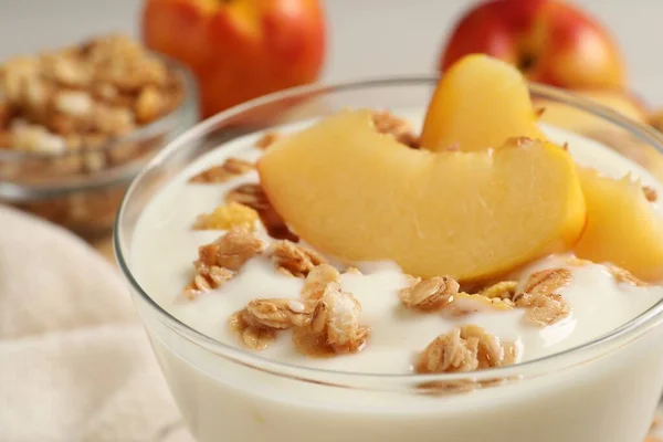 Tasty Peach Yogurt Granola Pieces Fruit Dessert Bowl Table Closeup — Stock Photo, Image