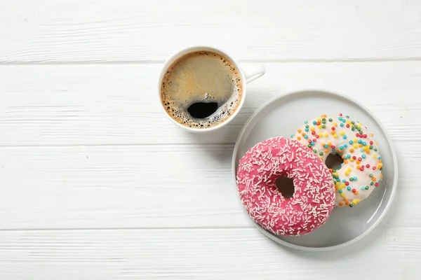 Yummy Donuts Sprinkles Coffee White Wooden Table Flat Lay Space — Stock Photo, Image