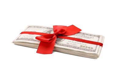 Stack of dollar banknotes with red ribbon isolated on white