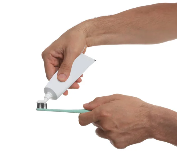 Man Applying Toothpaste Brush White Background Closeup — Stock Fotó