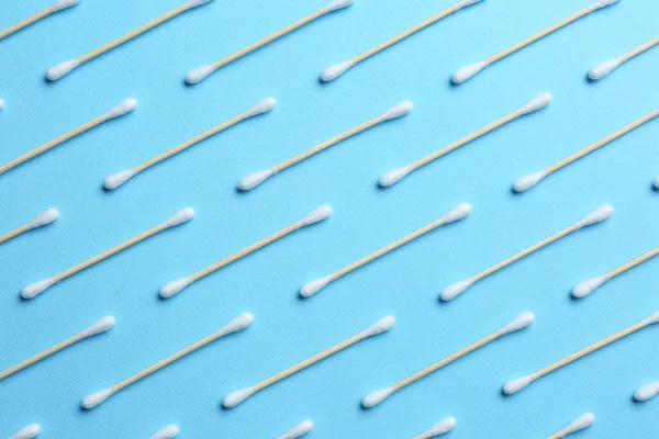 Many Cotton Buds Light Blue Background Flat Lay — 스톡 사진